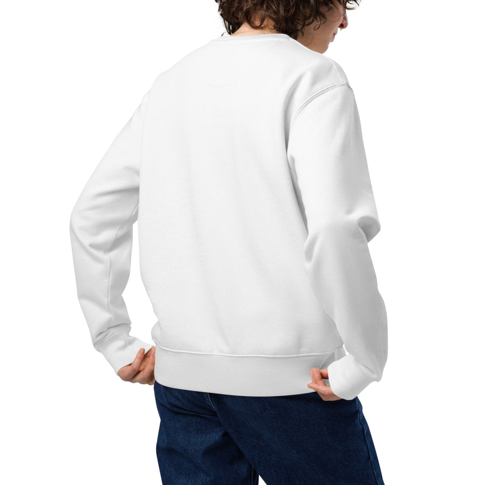 back view of model waring a white sweatshirt